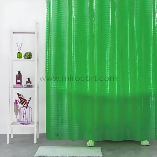 Green textured 3D shower curtain in a minimalist bathroom with white tiles and simple shelving.