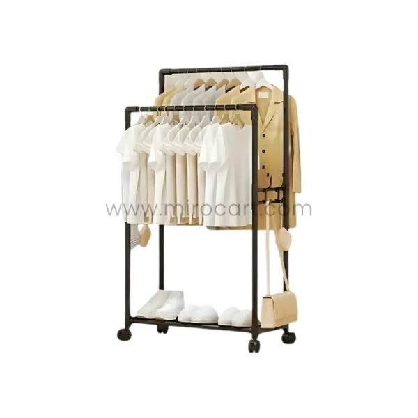 Black space-saving clothes rack with neatly hung shirts, shoes stored below, and a bag hanging on the side.