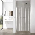 Transparent curtain in a bright bathroom with large windows and minimalist style.