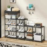 A black modular shoe rack with multiple layers and an additional top shelf, neatly organized in a modern entryway.