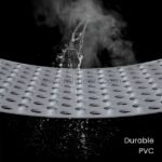 Gray non-slip massage bath mat with water droplets, highlighting durable PVC surface.