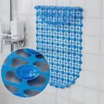 A blue non-slip shower mat with circular patterns, mounted on a wall with a close-up showing its suction cups.