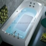 A transparent bath mat inside a modern bathtub filled with water, showing how it enhances safety.