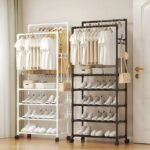 A sleek black and white space-saving clothes & shoe rack in a modern bedroom, keeping everything neat and off the floor.