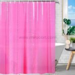 Bright pink textured 3D shower curtain with ridges and dots, styled in a modern bathroom with white tiles and tropical accents.
