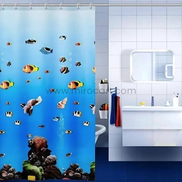 Close-up of an underwater-themed shower curtain showing detailed fish and coral artwork.