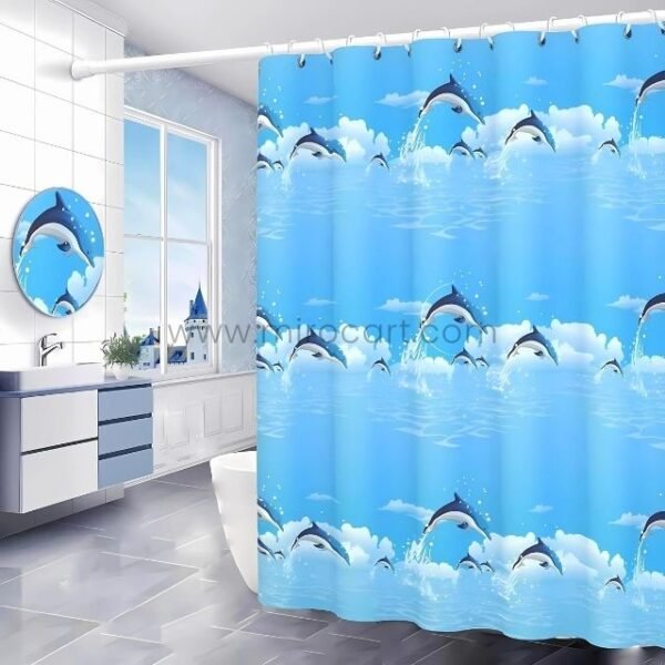 Dolphin shower curtain with vibrant sea life prints in a sunlit coastal-themed bathroom featuring a round mirror and window view.