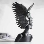 Close-up of black Celestial Winged Angel Sculpture, showing its dramatic texture and wing design.