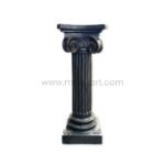 A standalone classical Roman pillar with intricate carvings and a dark finish, displayed cleanly against a white background.