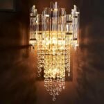 Intricate crystal details and golden finishes of the Crystal Cascade Wall Light up close.