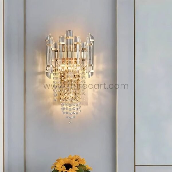 Crystal Cascade Wall Light shining in a bright minimalist room with soft hues and a sunflower pop.