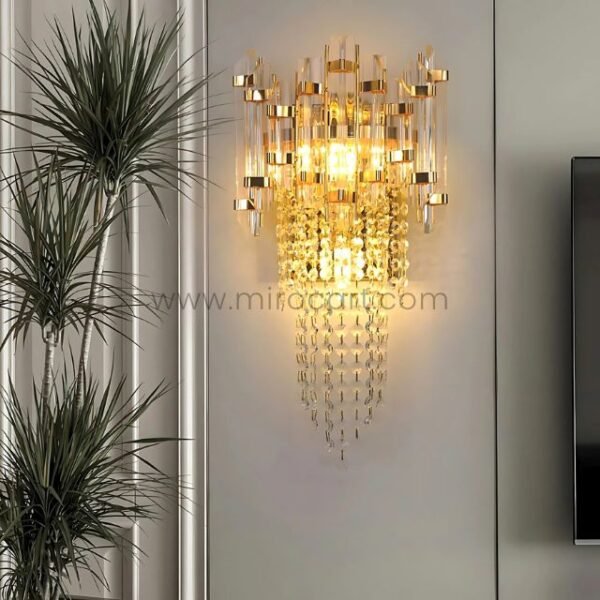 Crystal Cascade Wall Light softly illuminating a leafy corner for a balanced, luxe feel.