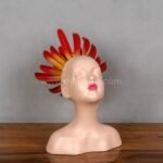 Close-up of the Innocent Flame Resin Sculpture showing soft resin texture and vivid flame crown.