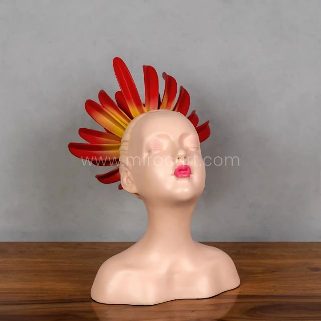 Close-up of the Innocent Flame Resin Sculpture showing soft resin texture and vivid flame crown.