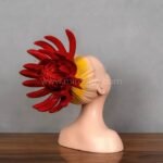 Side profile of the Innocent Flame Resin Sculpture, showing spikes and childlike calm.