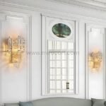 Twin Crystal Cascade Wall Lights flanking a window in a classically balanced layout.