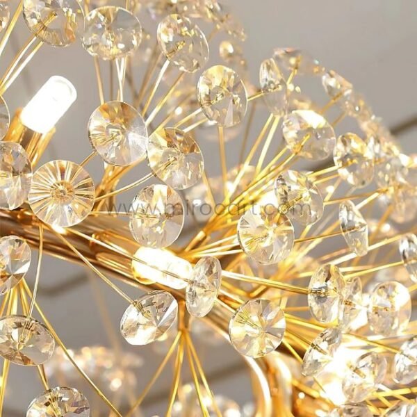 Close-up of chandelier’s cascading crystal branches catching the light.
