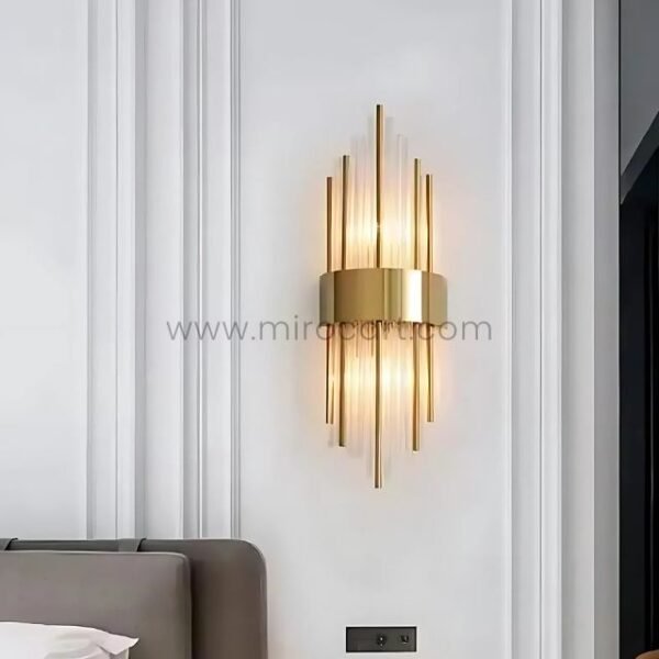 Modern Cascade Wall Light above a bed, softly lighting a modern bedroom.