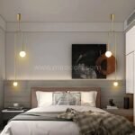 Twin gold modern arc pendant lights above a bed for symmetrical bedroom lighting.