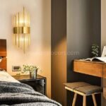 Modern Cascade Wall Light in a minimalist bedroom with soft, ambient lighting.
