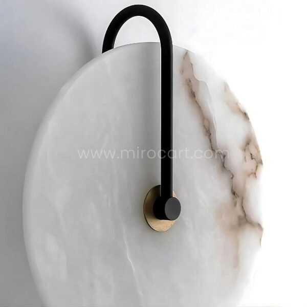 Close-up of Moonlit Alabaster Wall Light showing gold frame, veining, and smooth alabaster surface.