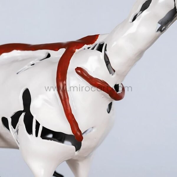 Close-up of Shattered Ride sculpture’s neck and head, revealing chipped surface and fading form.