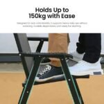 Close-up of stable foldable chair from modern outdoor table set with seated person