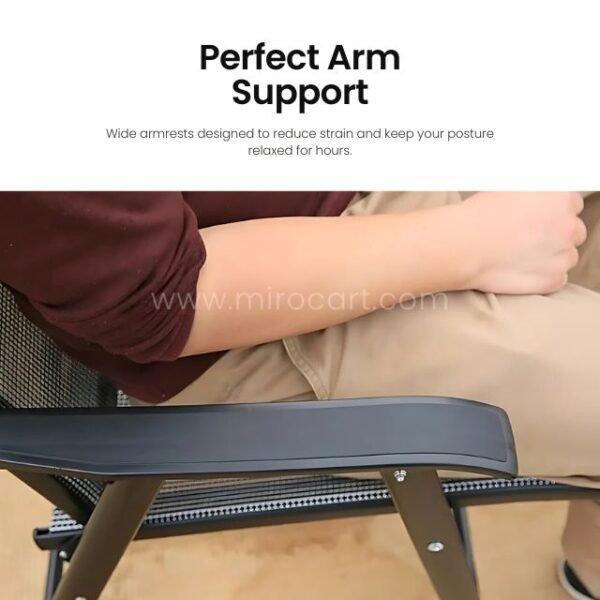 Person resting on wide armrests of a modern outdoor chair, showing ergonomic comfort.