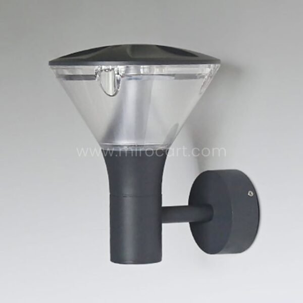 Close-up of modern outdoor wall light with smooth black finish and compact structure.
