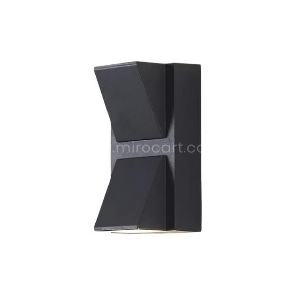 Angled view of a modern up and down wall light, showing its boxy form and directional lighting.