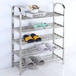 Premium stainless steel shoe rack decorated with colorful slippers, a book, and flowers on top.