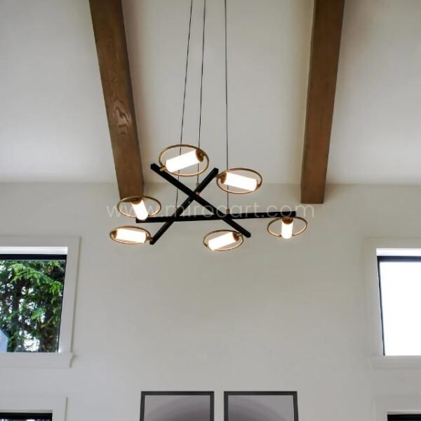 Modern Cross Pendant Chandelier in a bright living room with tall ceilings and wooden beams.