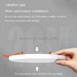 Ultrathin sleek LED ceiling downlight with 20mm slim profile in hand.
